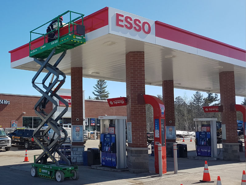 safeguard worker in a bucket truck